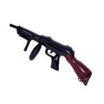 רובה מאפיה מתנפח שחור וחום כאביזר לתחפושת גנגסטר.